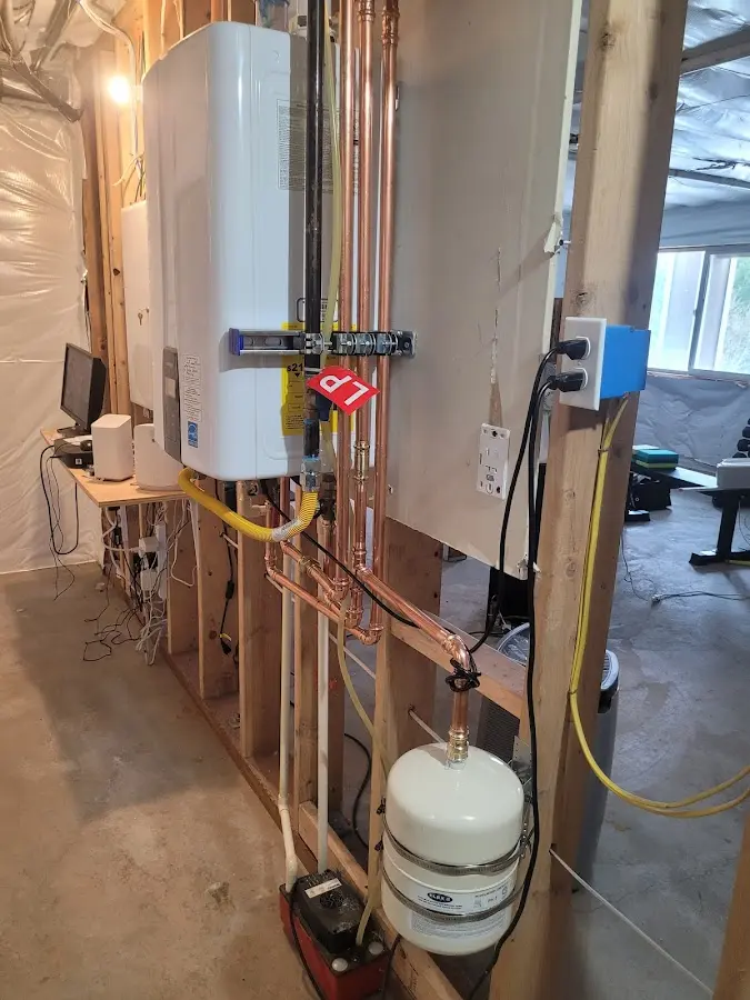 Licensed plumber repairing a kitchen sink in Eagle